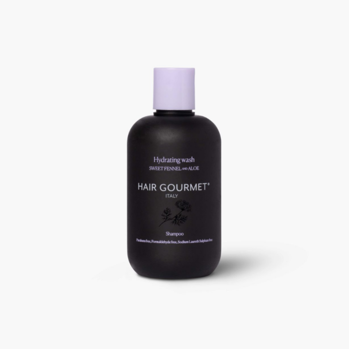 air Gourmet niisutav šampoon magusa apteegitilli ja aaloega, pudel valgel taustal kuivadele juustele mõeldud juuksehooldustootest.